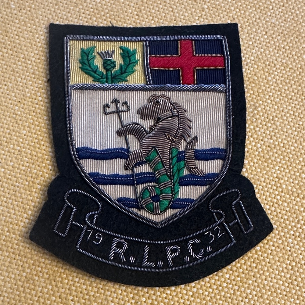 Ralph Lauren crest patch made with bullion wire. Hand stitched